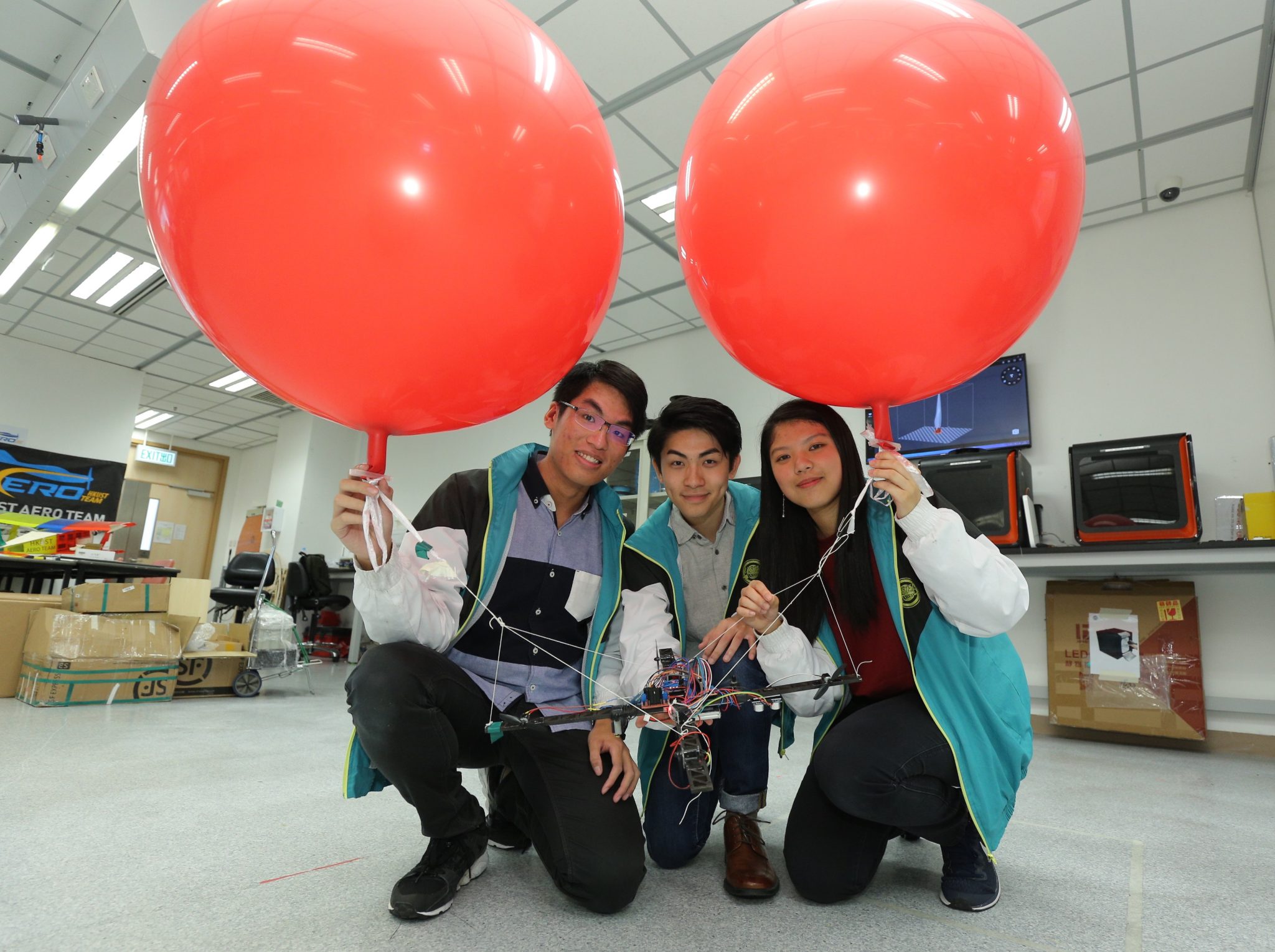 Engineering student and graduates who served as student technical advisors in USEL Lab during their undergraduate years: (from left) Wong Ching-Fung, Jeffrey Tsang Lok-Hay and Hazel Lam Wing-Laam