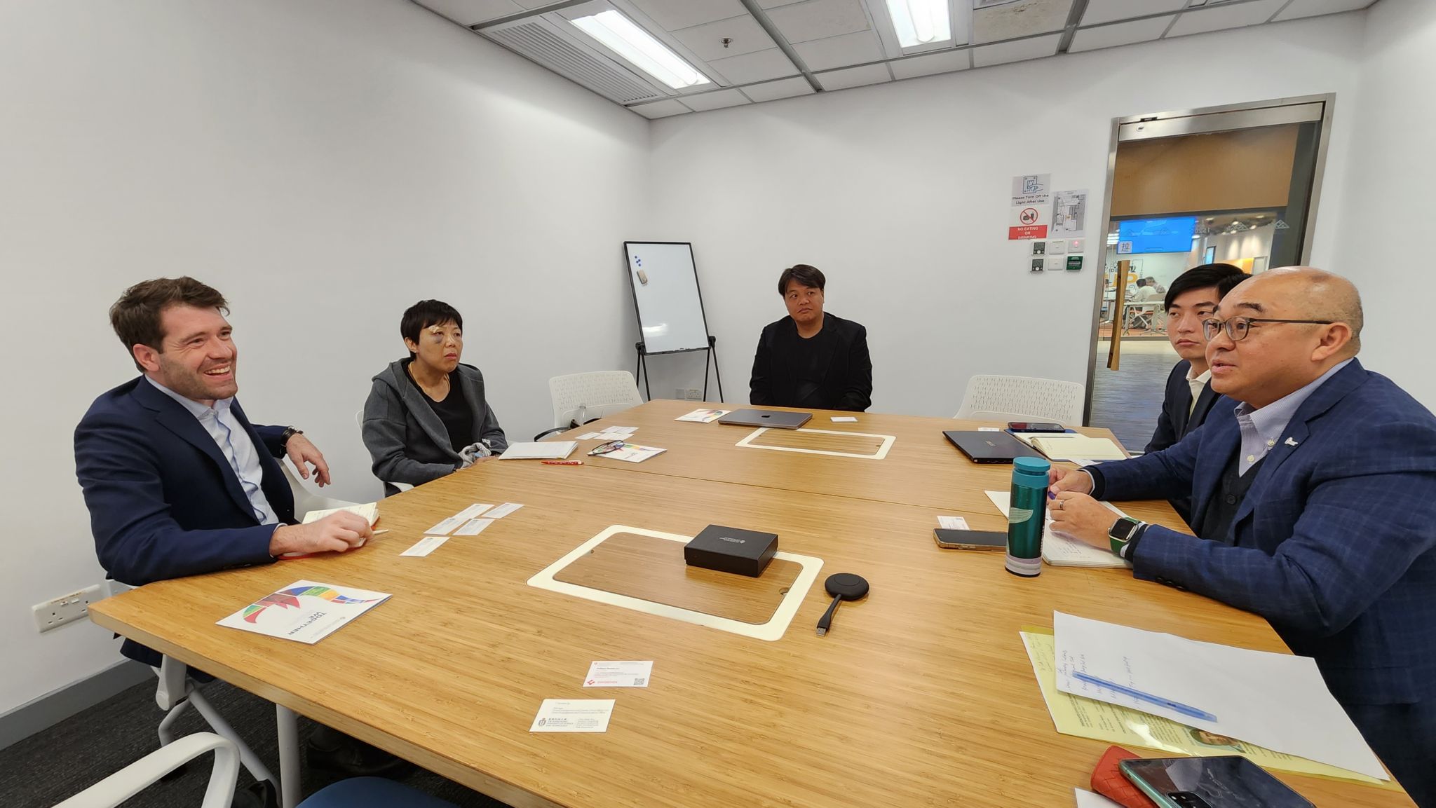 Dr. Philippe ROESLE (first from left) engaged in discussions with our OKT and Entrepreneurship Center (EC) teams.