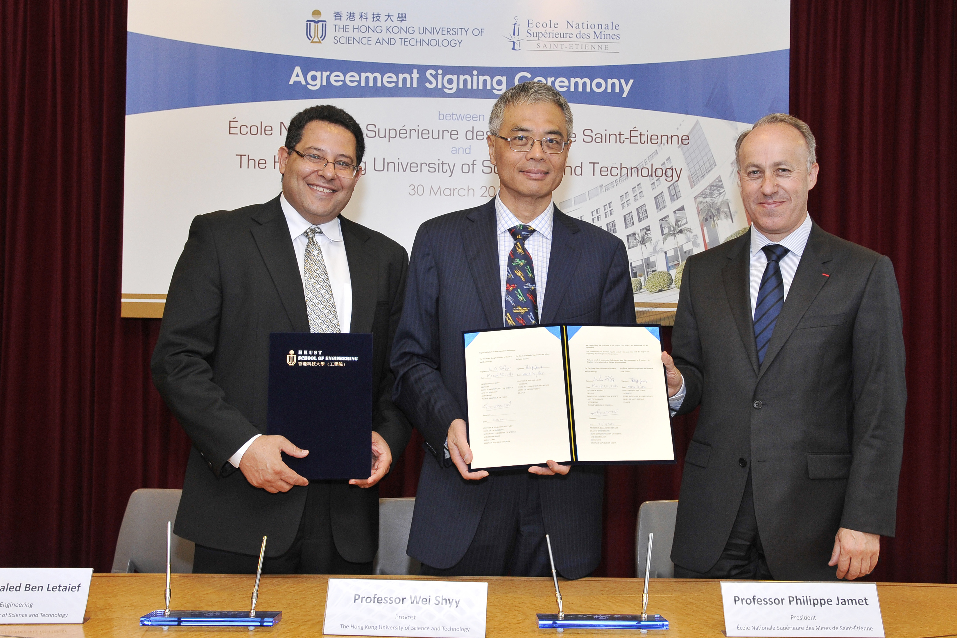 HKUST Provost Prof Wei Shyy (center), HKUST Dean of Engineering Prof Khaled Ben Letaief (left) and ENSMSE President Prof Philippe Jamet sign the memorandum and agreement.