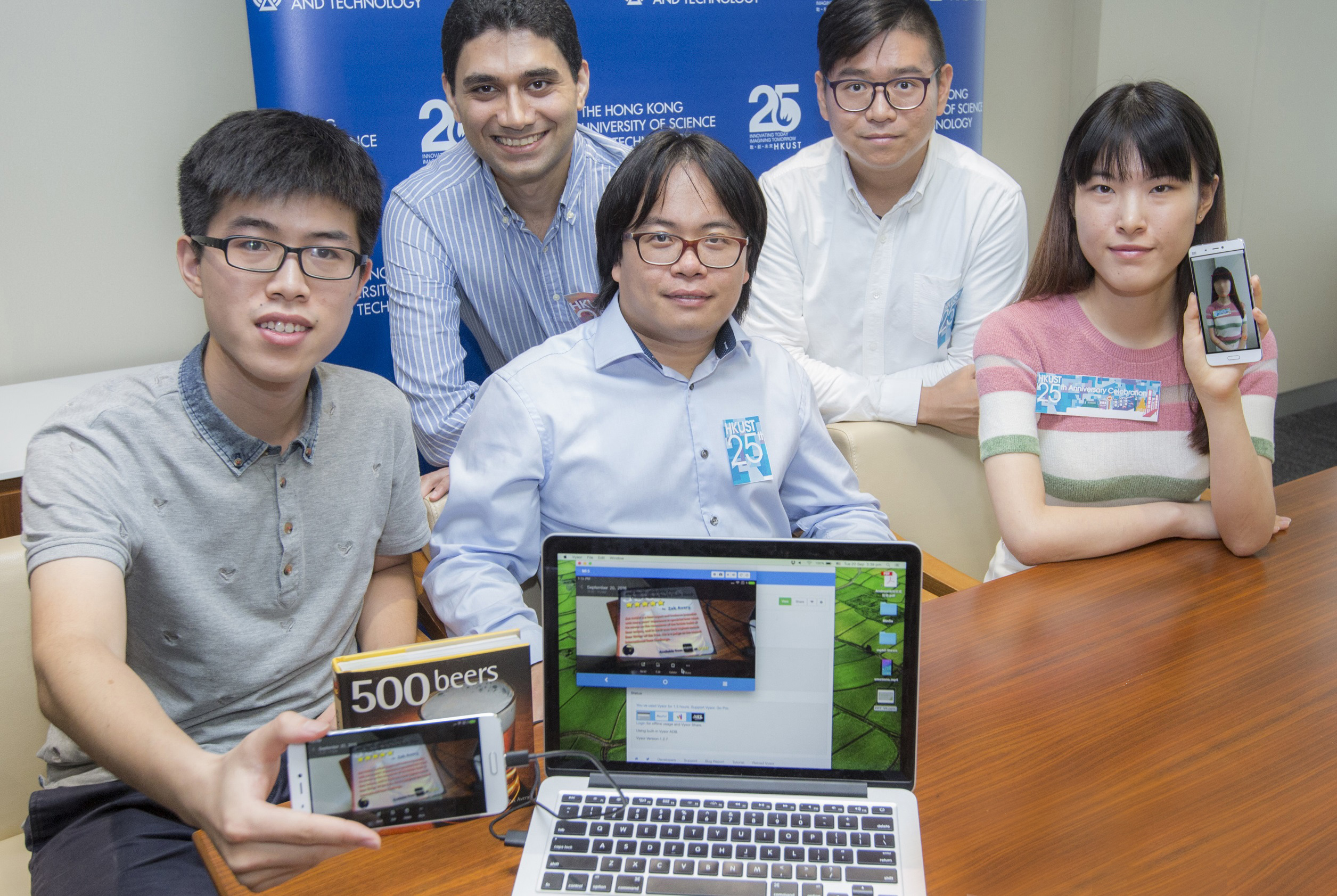  Prof Pan Hui (middle front) and his research team.