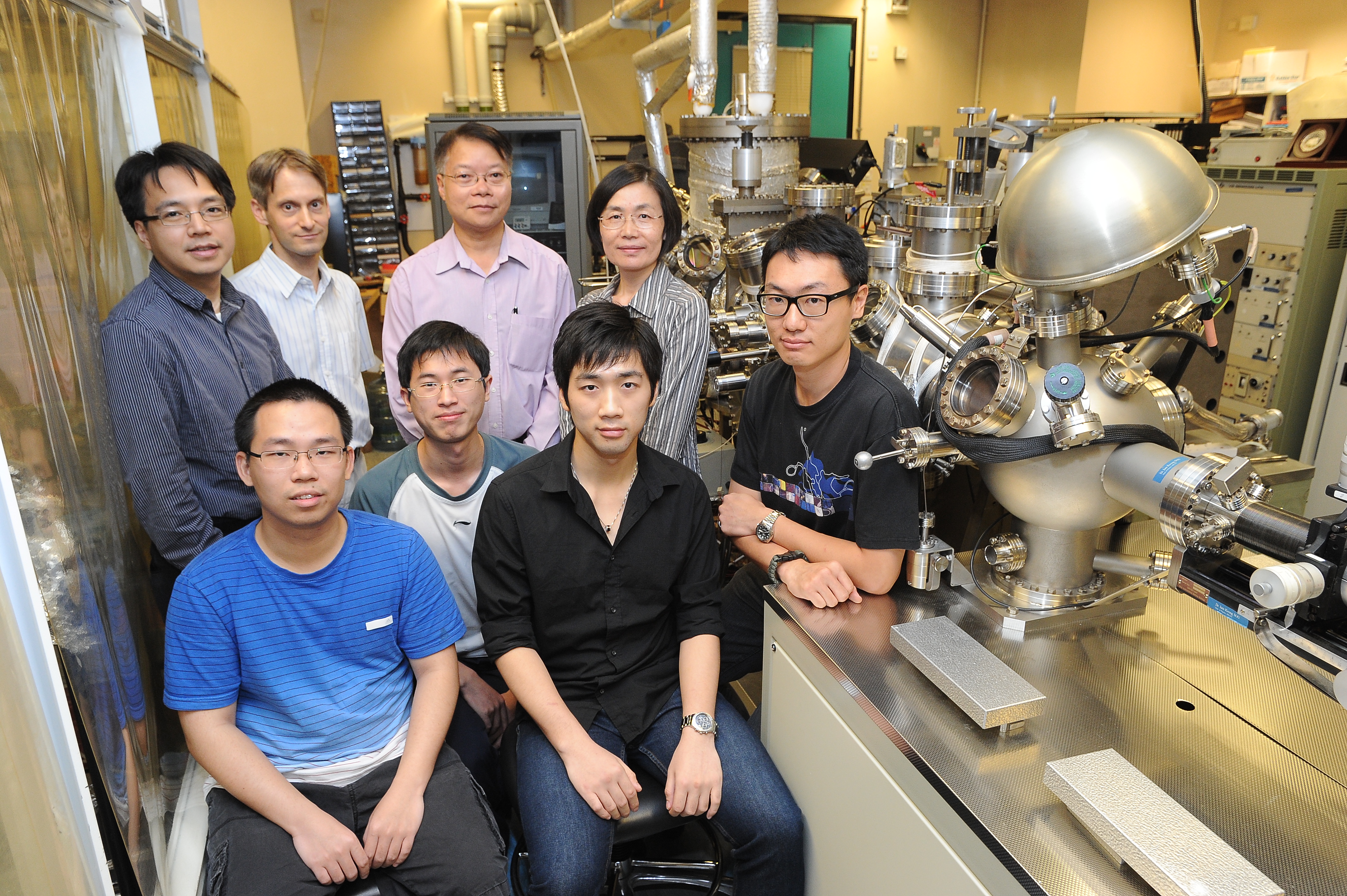  Research team from the Department of Physics: (Back row from left) Prof Kam-tuen Law, Prof Rolf Lortz, Prof Iam-keong Sou, Prof Jiannong Wang and (front row) their postgraduate students and postdoctoral associates.