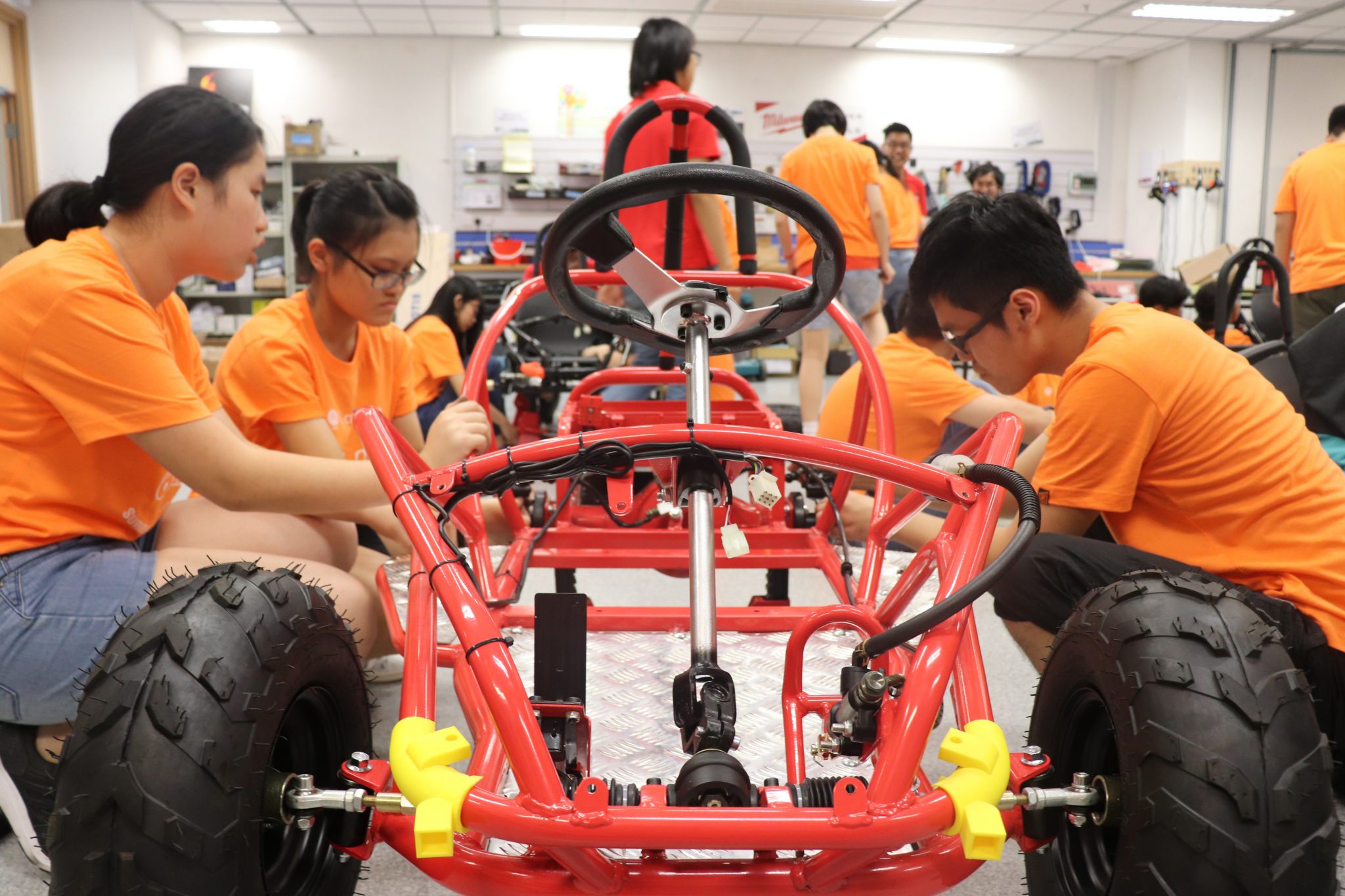  Bit by bit, the wheels and different systems are put together.