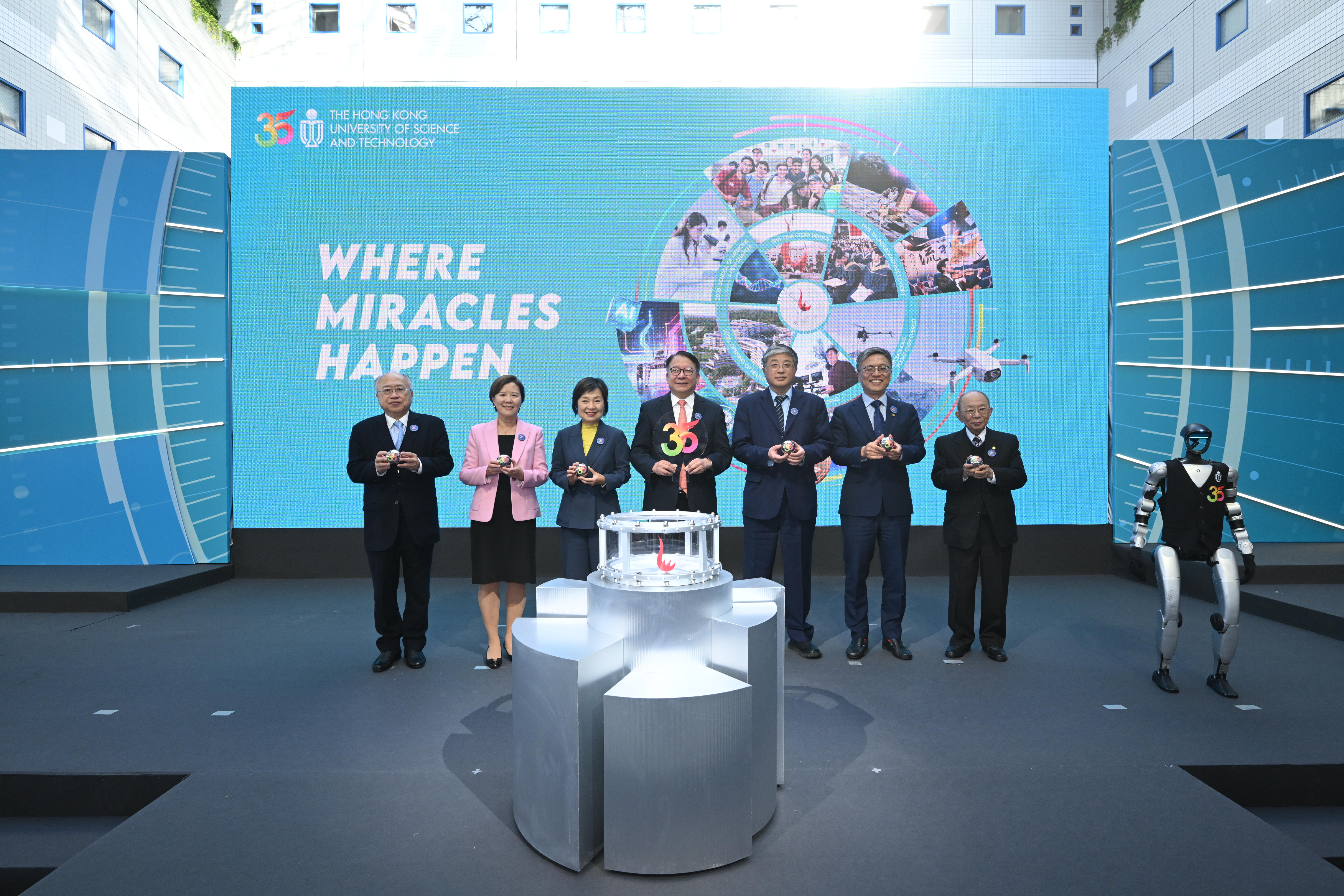 The Chief Secretary for Administration of the HKSAR Government Mr. CHAN Kwok-ki (middle), Deputy Director of LOCPG Mr. LUO Yonggang (third right), Secretary for Education of the HKSAR Government Dr. Christine CHOI Yuk-lin (third left) and members of the HKUST leadership team, including Pro-Chancellor Dr. John CHAN Cho-Chak (first right), Council Chairman Prof. Harry SHUM (second right), Court Chairman Dr. the Honorable Andrew LIAO Cheung-Sing (first left), and President Prof. Nancy IP (second left) inaugura