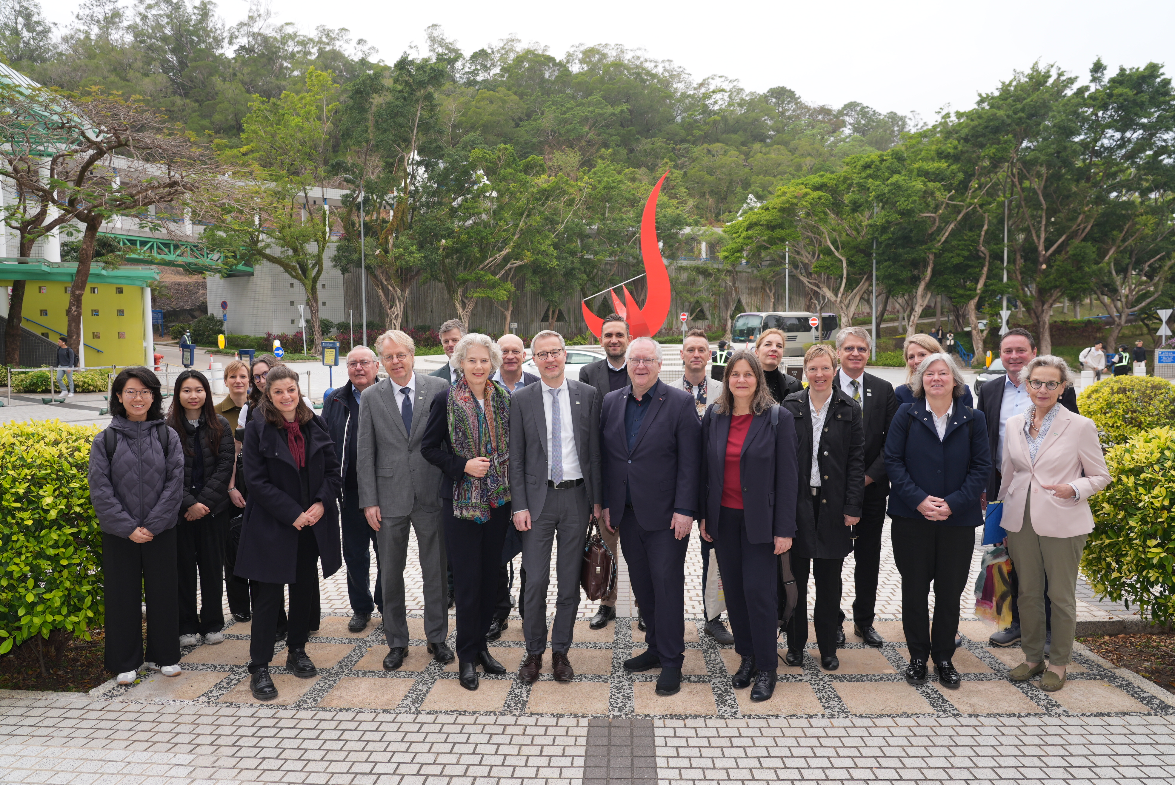 Group photo in front of the iconic landmark of HKUST, Redbird Sundial.
